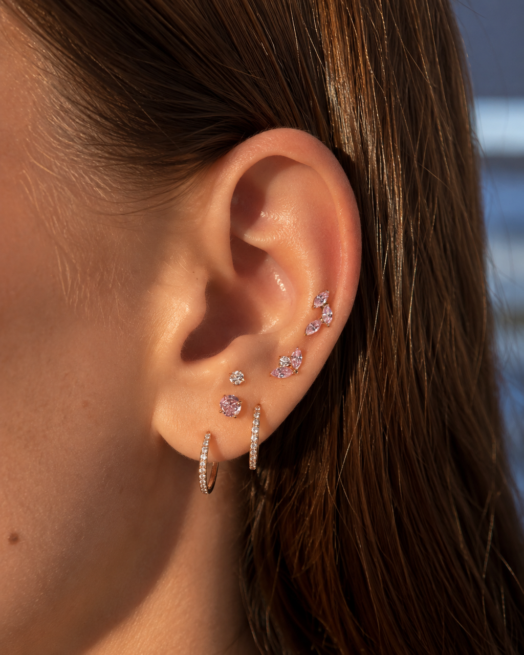 Piercing caminera pétalos rosas titanio