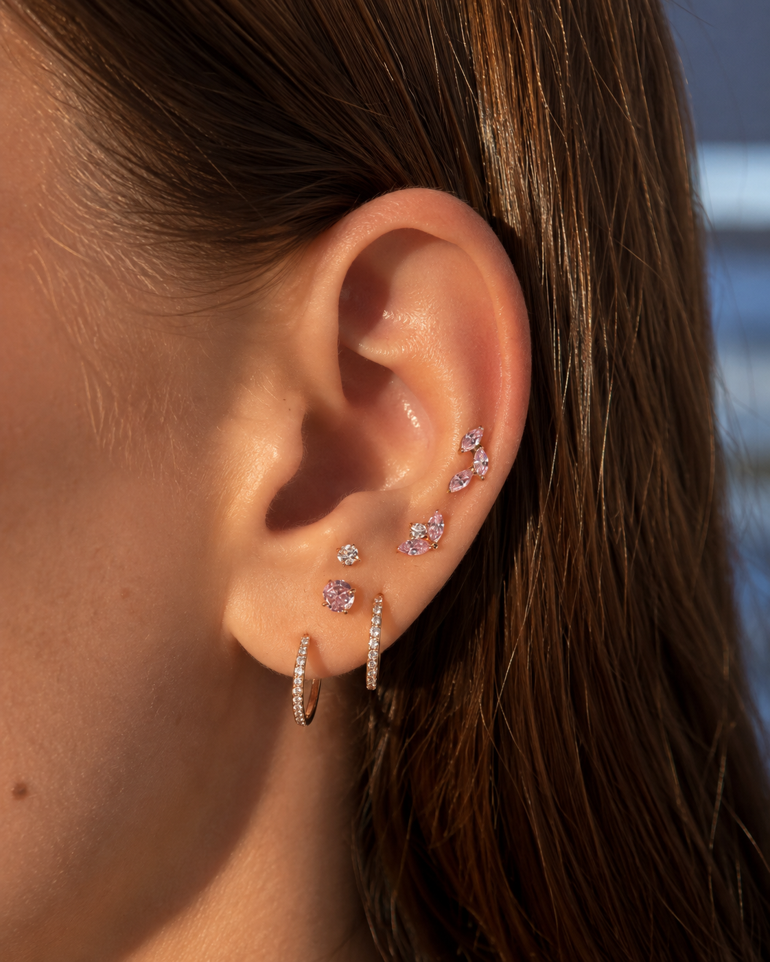 Piercing caminera pétalos rosas titanio