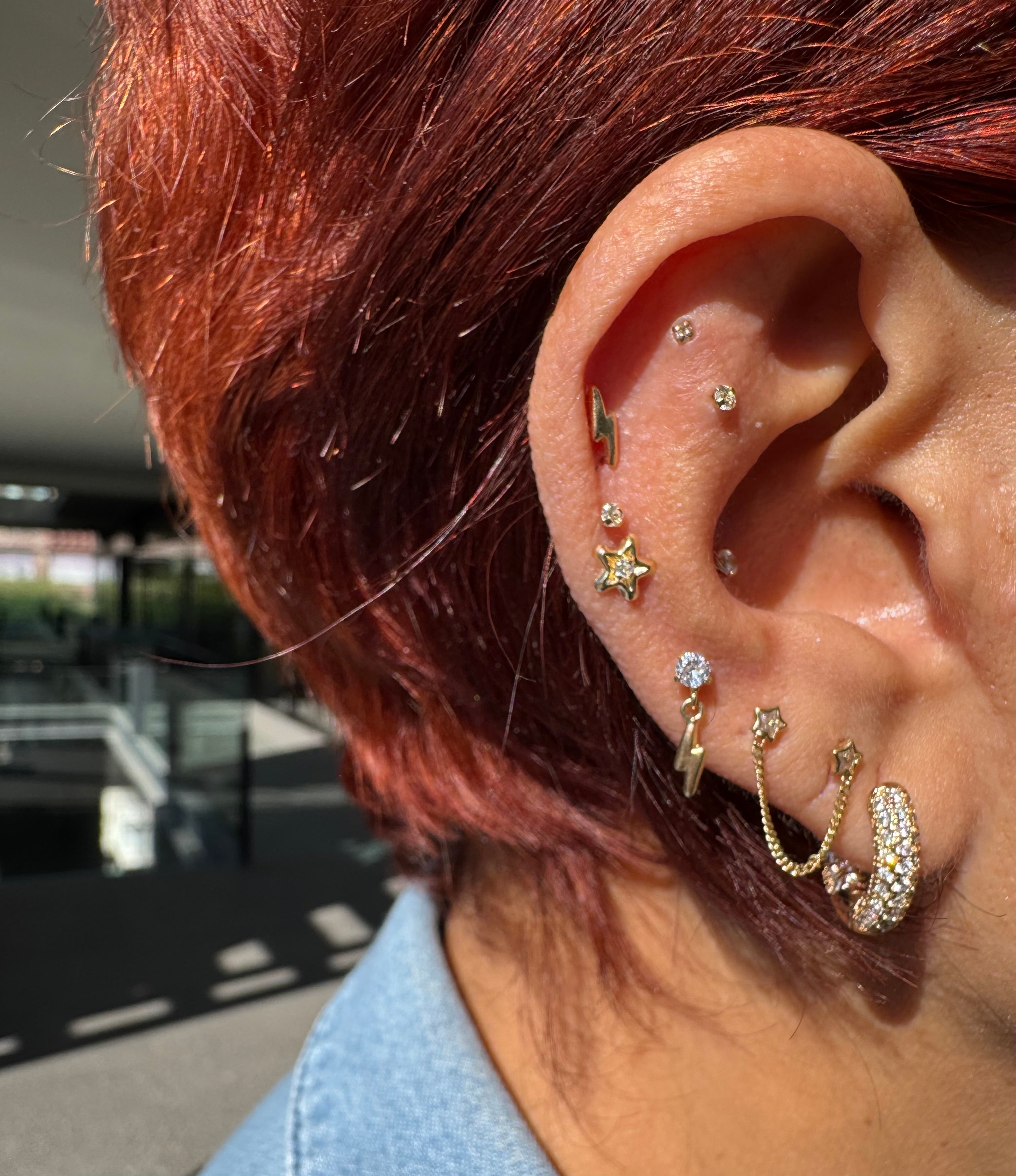 Piercing estrella con zirconia oro 10k