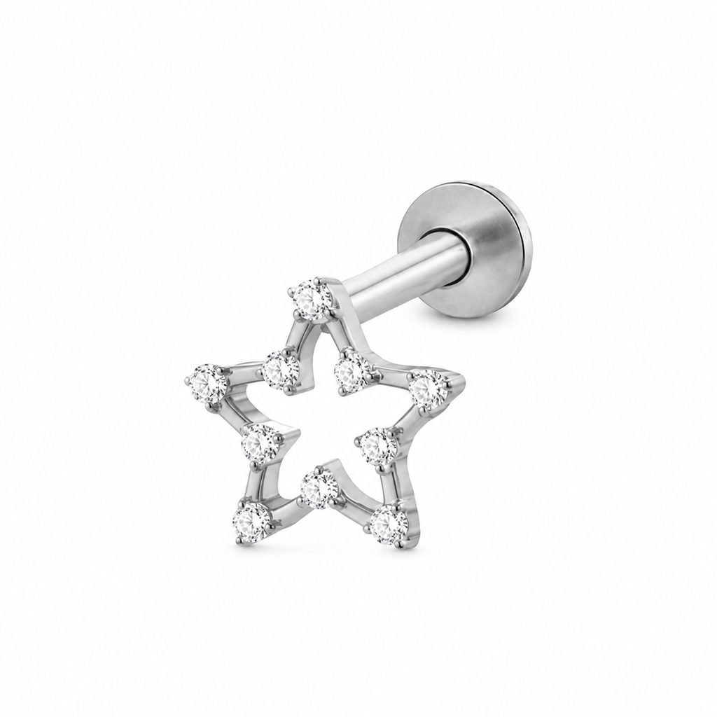 Piercing estrella silueta circonias plateada titanio