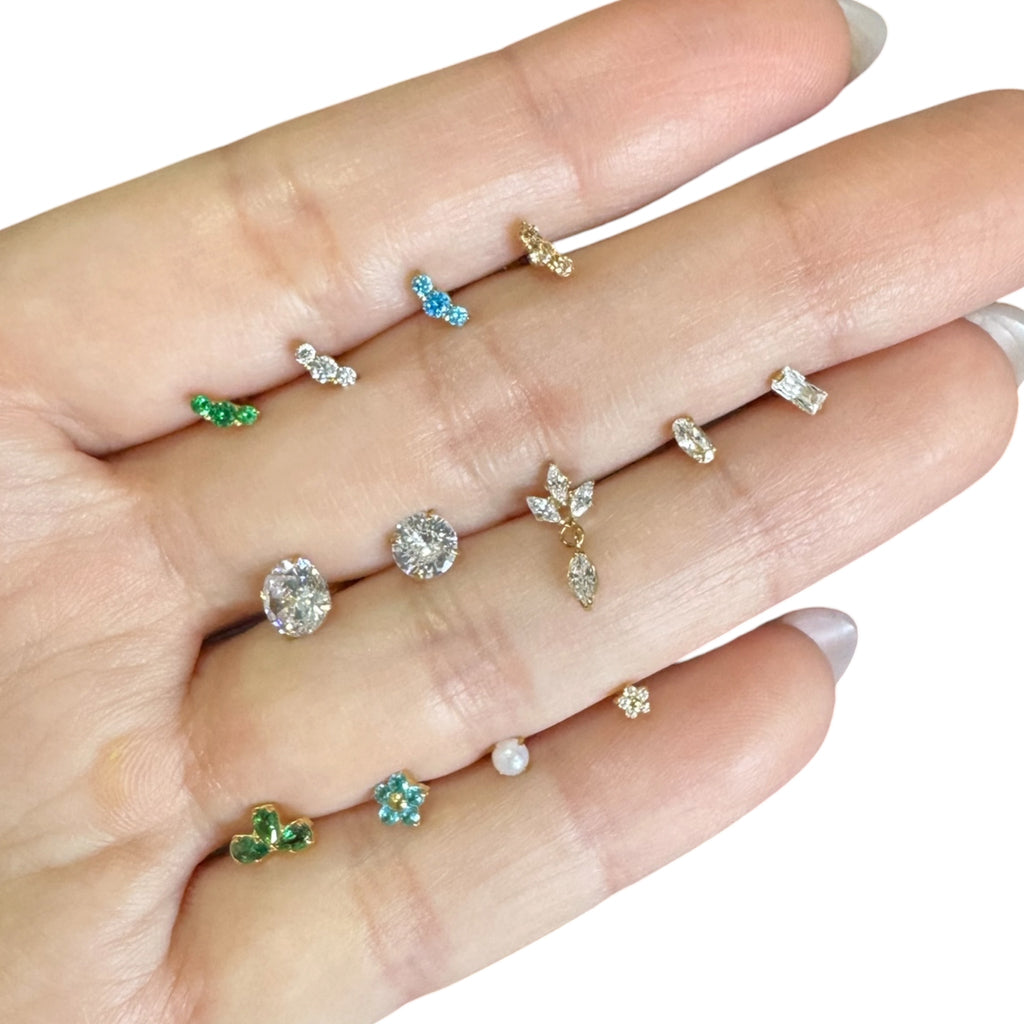 Piercing corona picuda con ovalo colgante titanio