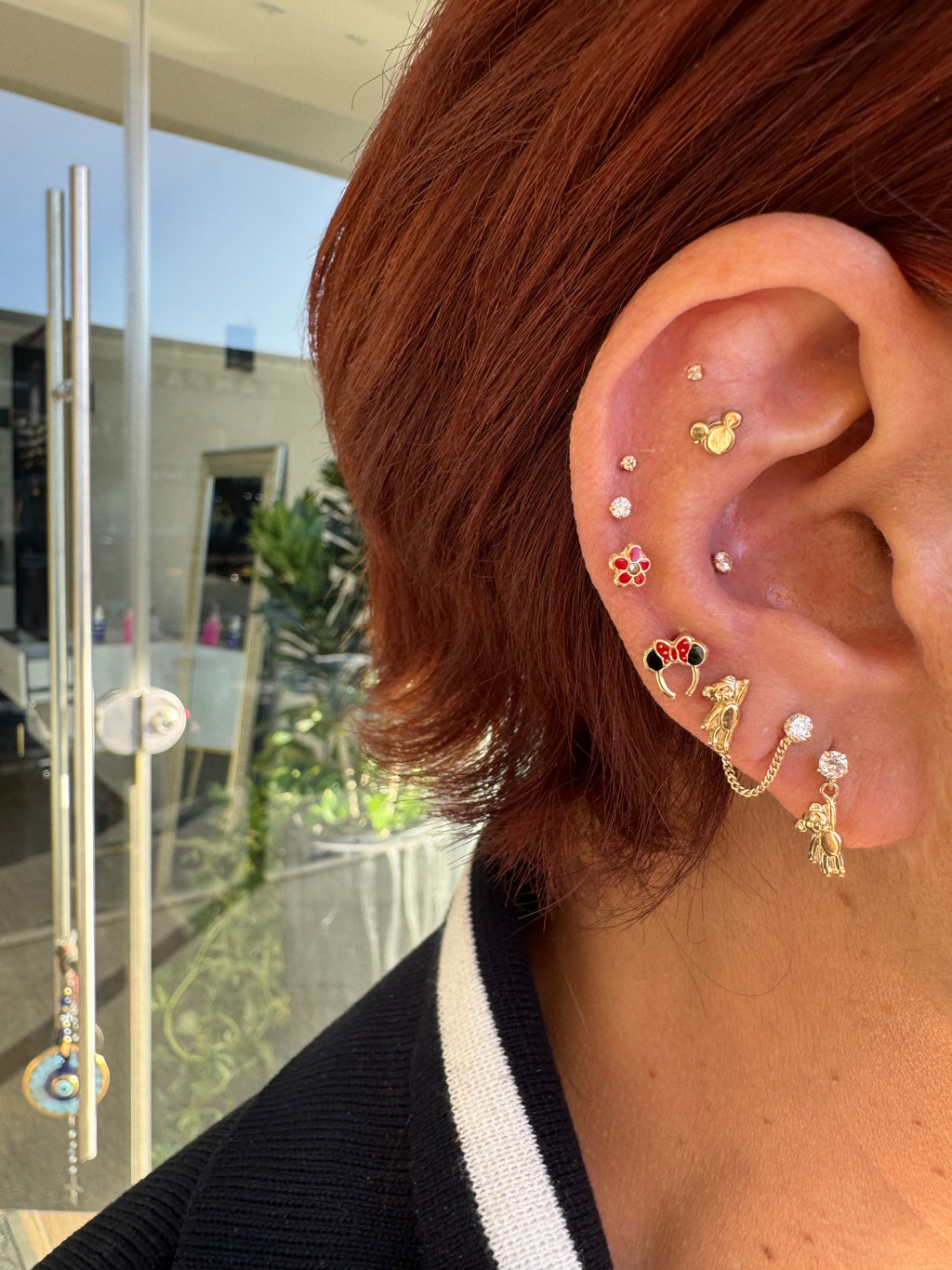 Piercing flor roja oro 10k