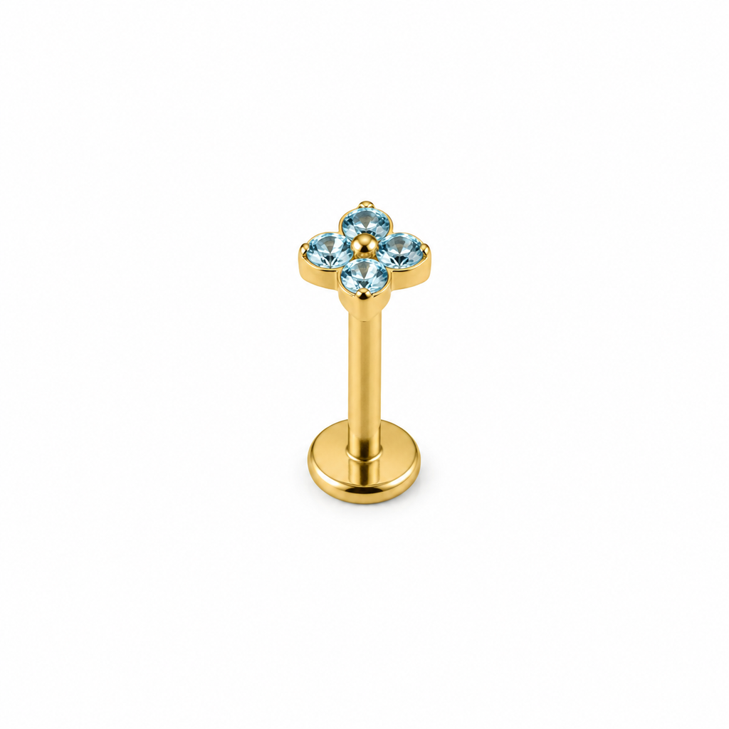 Piercing mini flor de 4 celeste titanio
