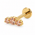 Piercing caminera de 3 zirconias champagne titanio