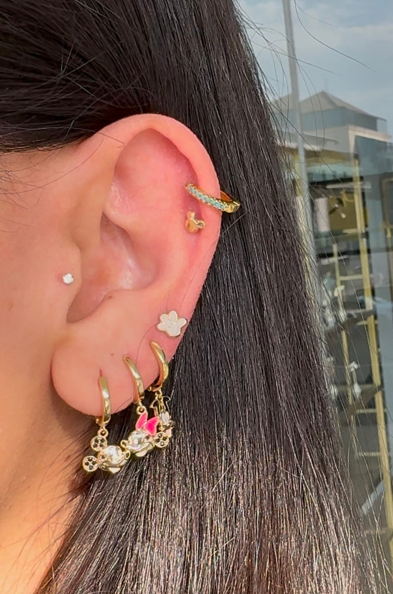 Piercing mano mickey
