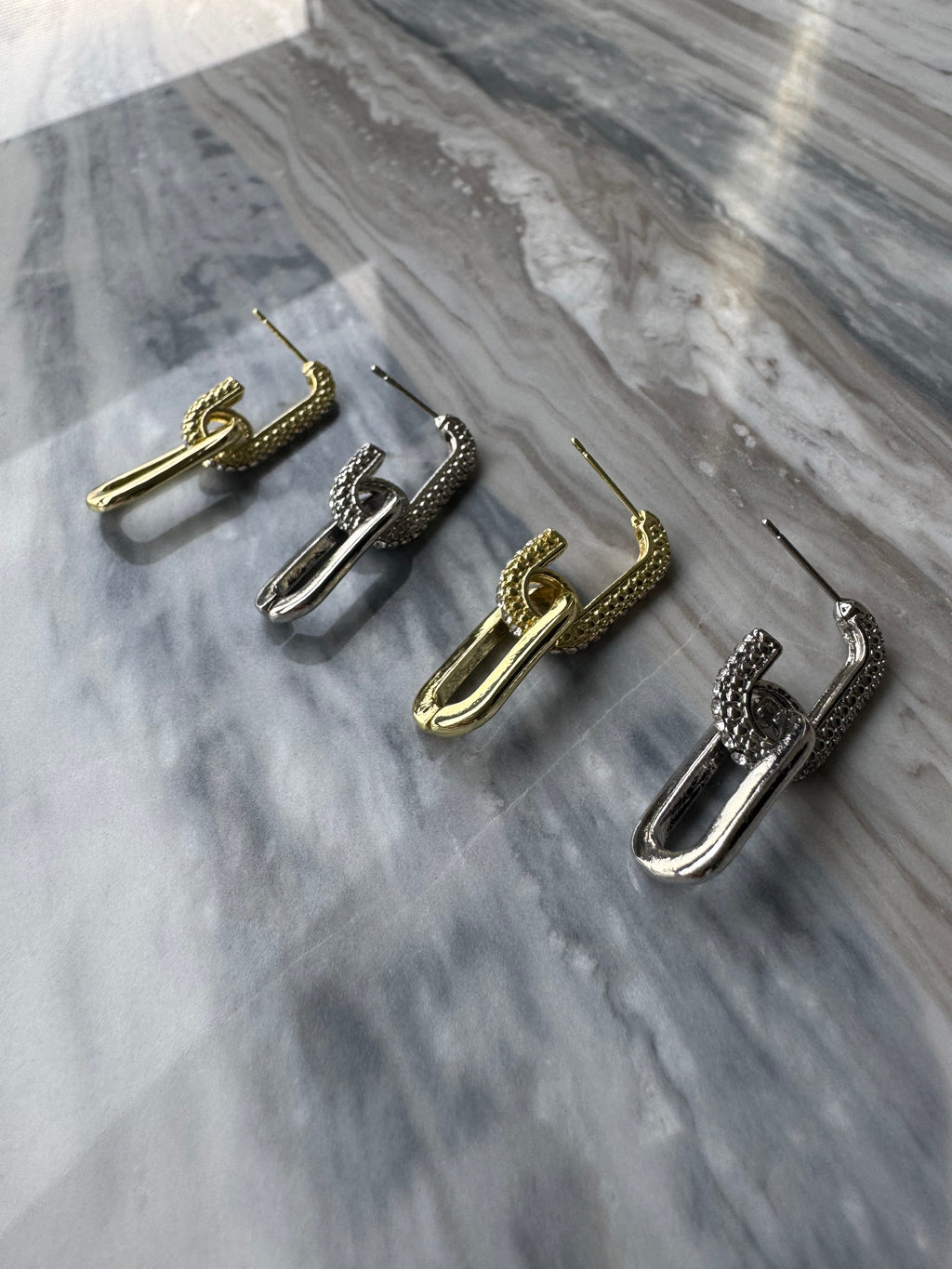 Golden Milos studs