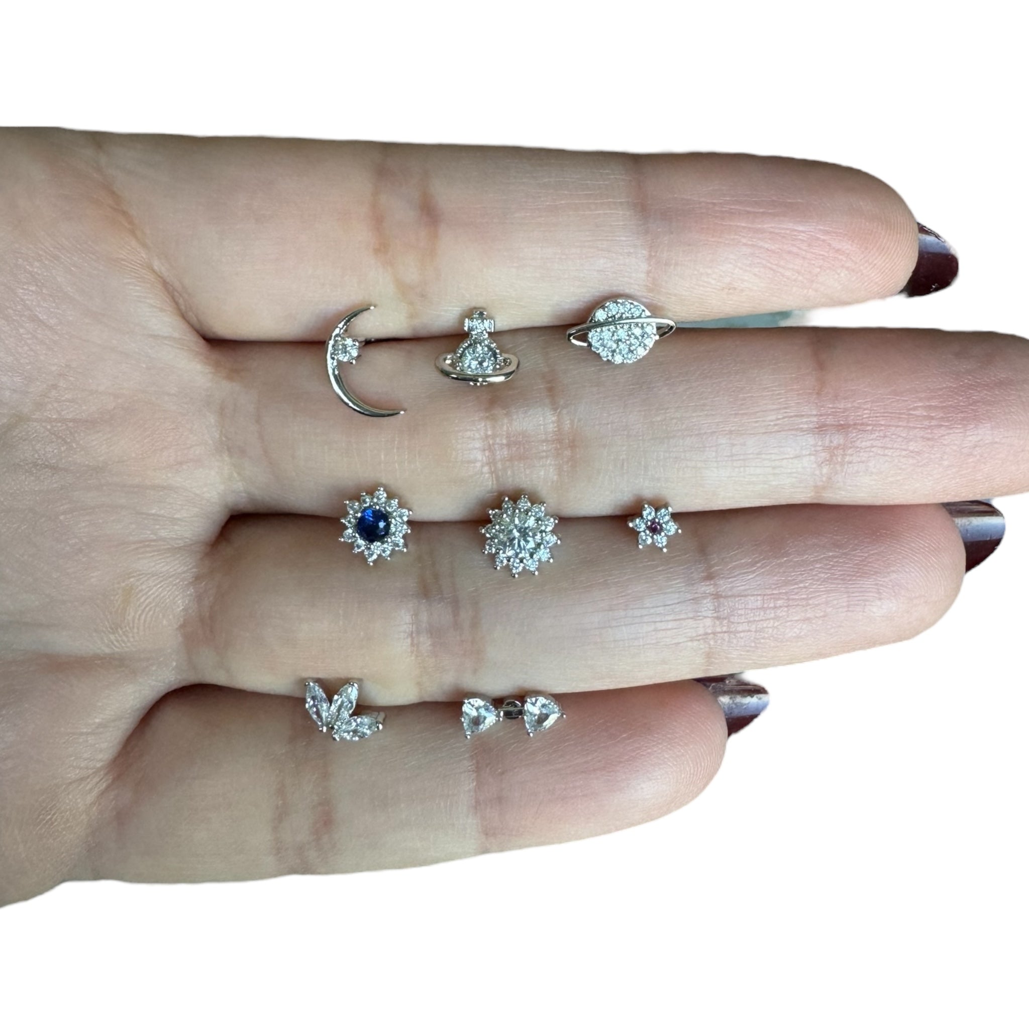 Piercing gota fuscia plateada