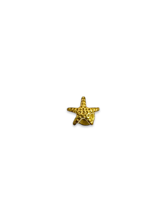 Piercing estrella de mar titanio