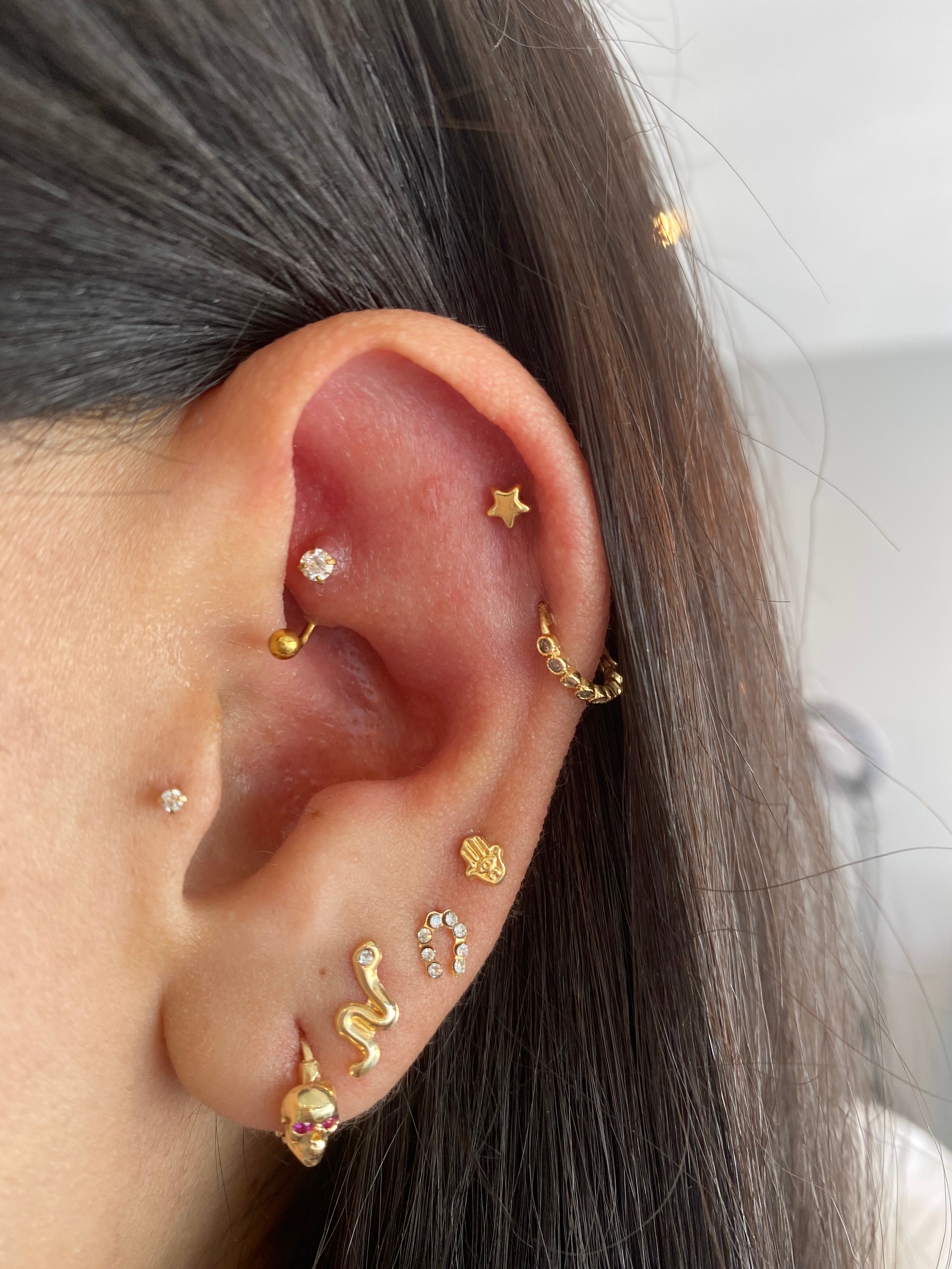Piercing manita de hamsa oro 14k