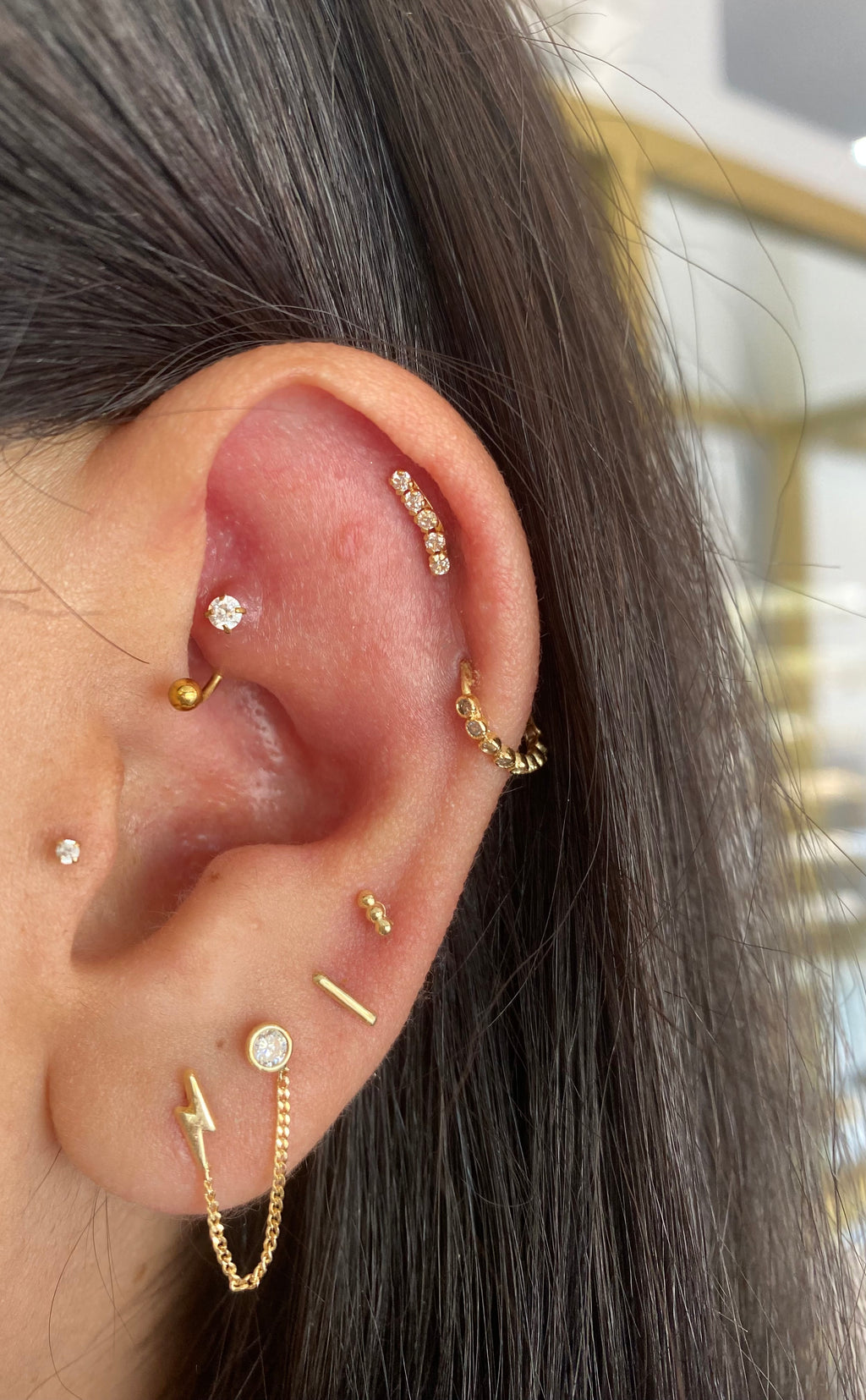 Piercing caminera blanca oro