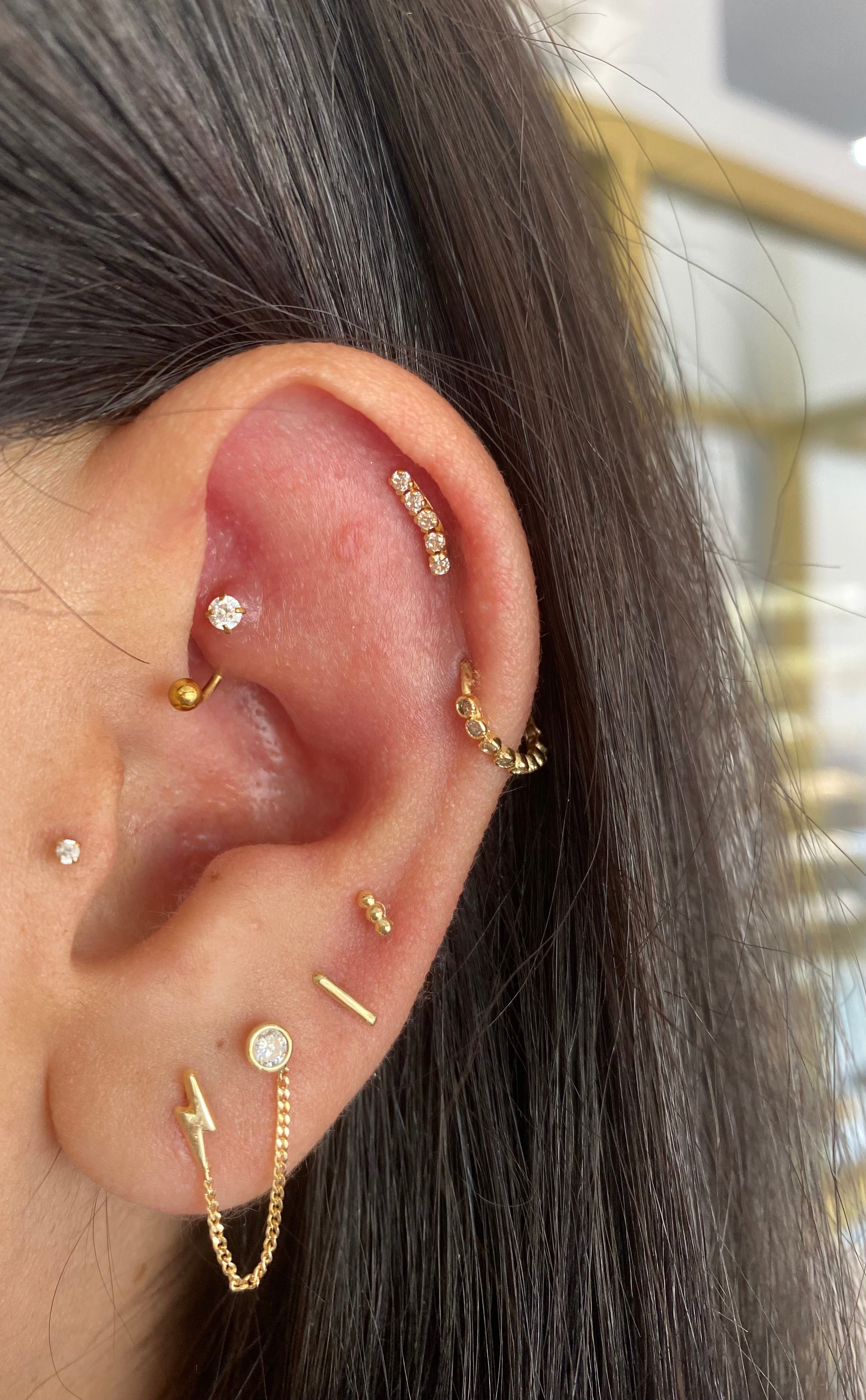 Piercing caminera blanca oro