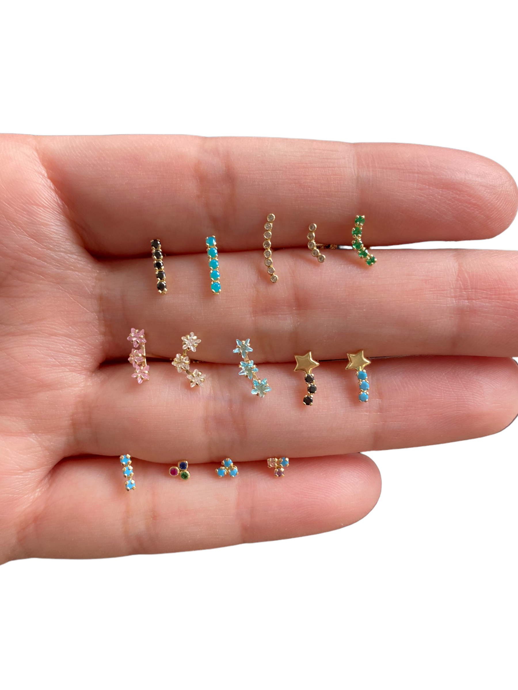 Piercing 3 estrellas blancas