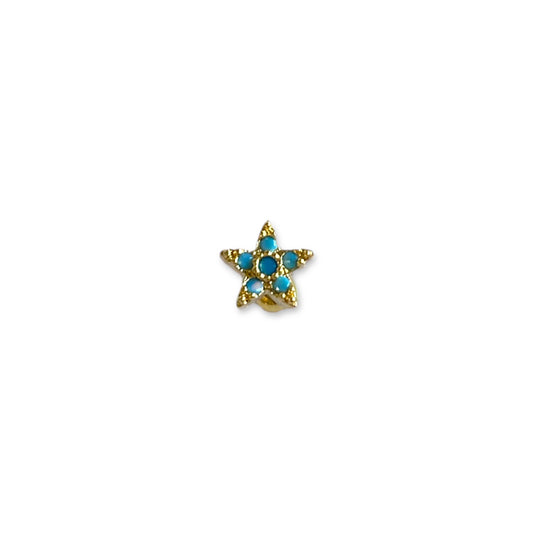 Piercing estrella turquesa